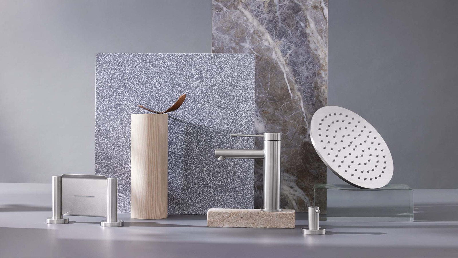 Phoenix Tapware product styling with stone and timber