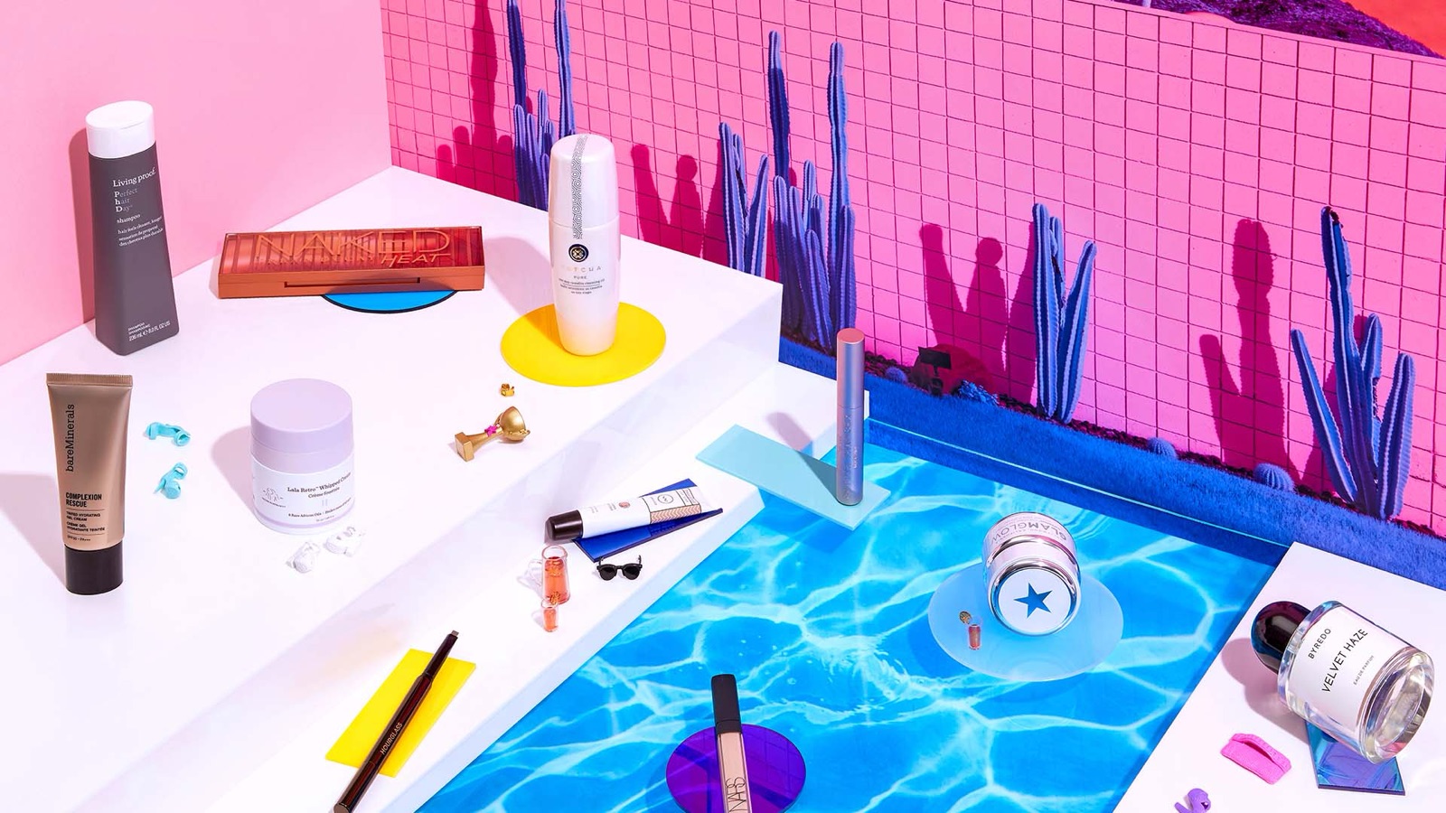 MECCA beauty products in a pool-side set